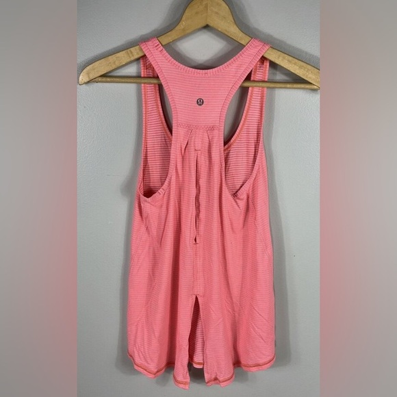 Lululemon Salute the Sun Tank
Heathered Very Light Flare EUC - Picture 6 of 6